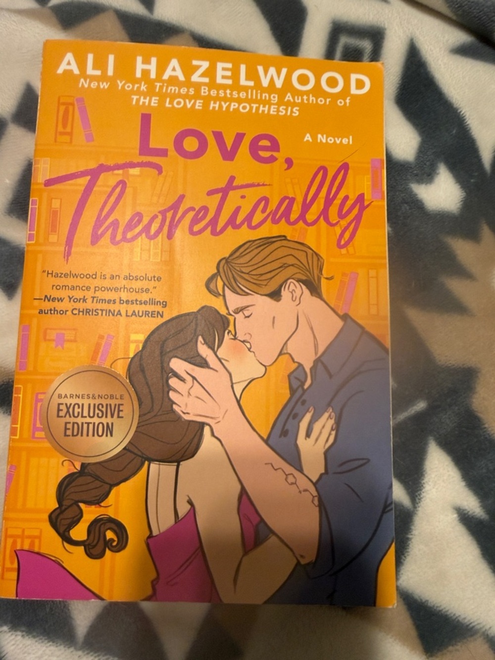 Love, Theoretically by Ali Hazelwood - Bright Orange Romance Paperback